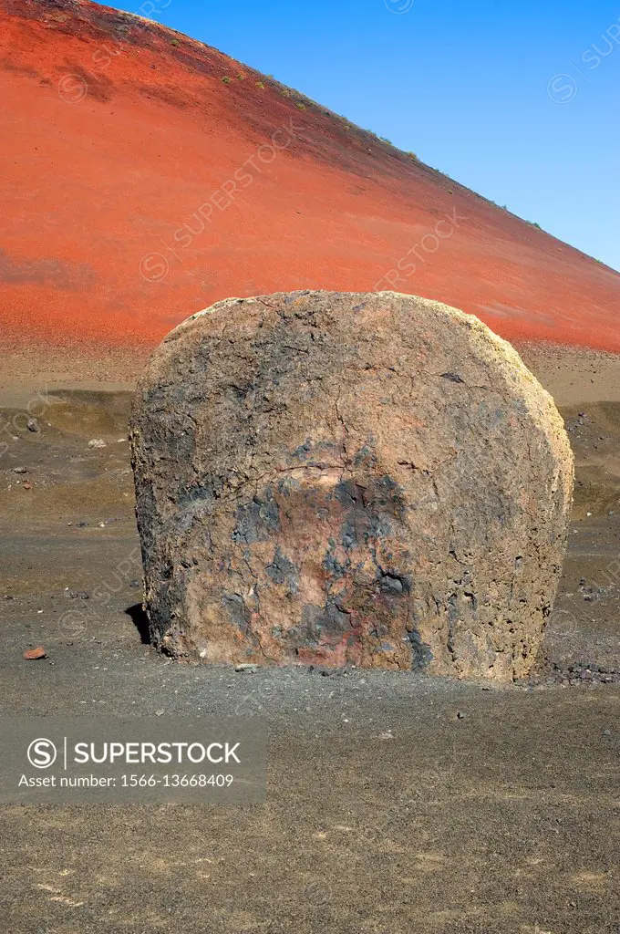 Giant volcanic bomb. Montana Roja Volcano, Lanzarote Island, Canary Islands, Spain.