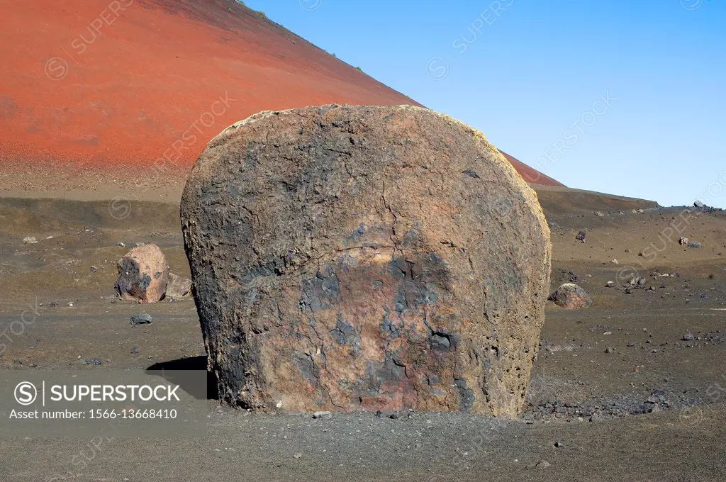 Giant volcanic bomb. Montana Roja Volcano, Lanzarote Island, Canary Islands, Spain.