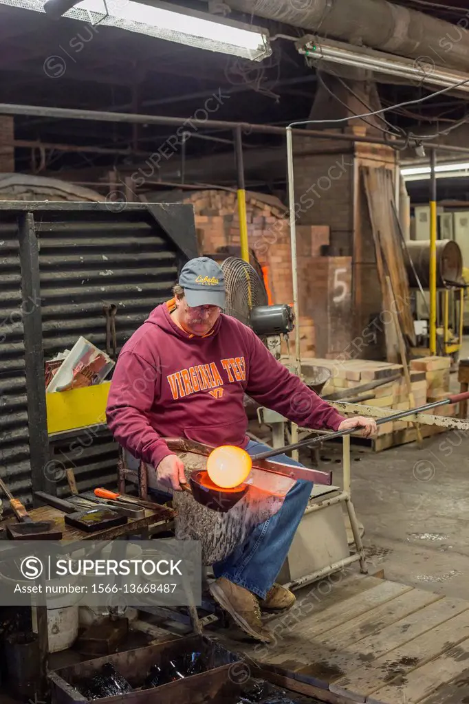 Milton, West Virginia - Glassblower at work at the Blenko Glass Company.