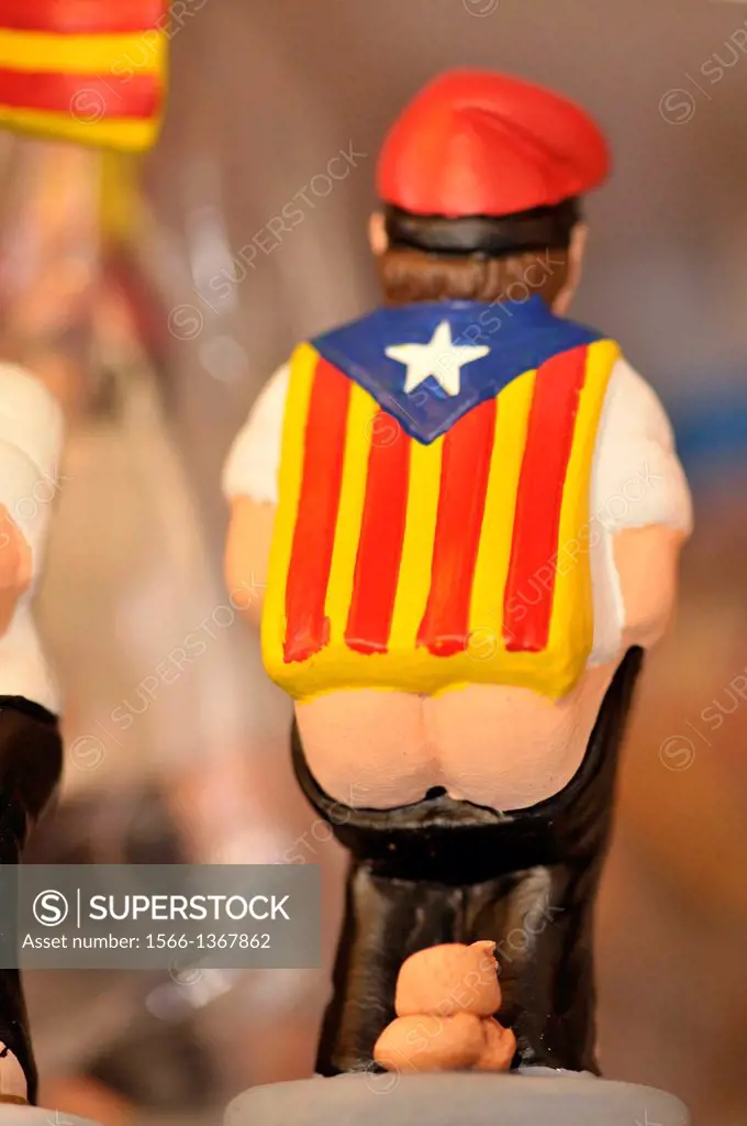 Caganer, typical Catalan figure, with indenpedentist flag, for Christmas decoration, Barcelona, Catalonia, Spain