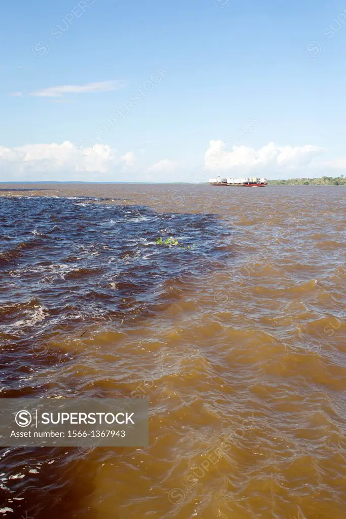 Brazil, Amazonas state, Amazon River, phenomenon of the meeting of waters, the black waters of the Rio Negro meet the white waters of the Rio Solimoes...