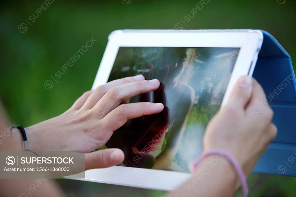 Woman during online chat with a tablet.