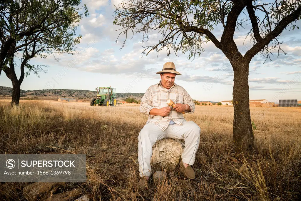 Farmer resting after work in his farmland. Made in August of 2013 in Caudé, a small village in Aragon, close to Teruel. Spain.