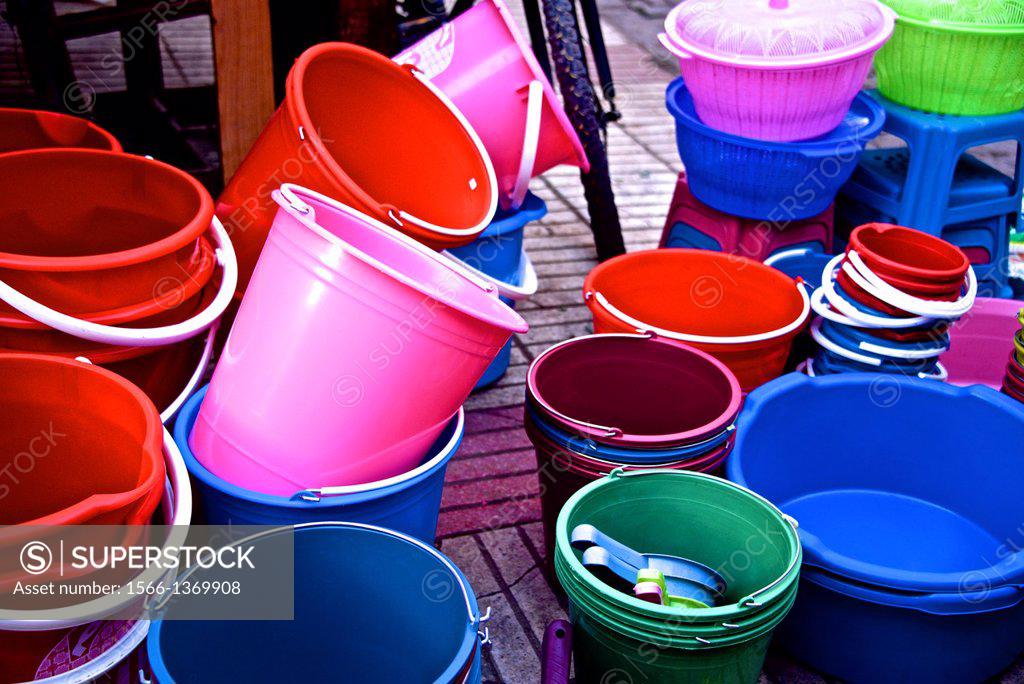 Plastic pails and buckets, for sale in the street of the Medina, Marrakech,  Morocco, North Africa. - SuperStock