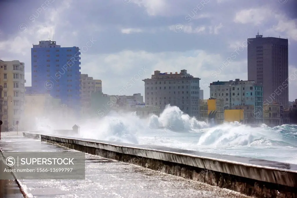 Wave breaking over the wall of the Malecon, Havana, Cuba.
