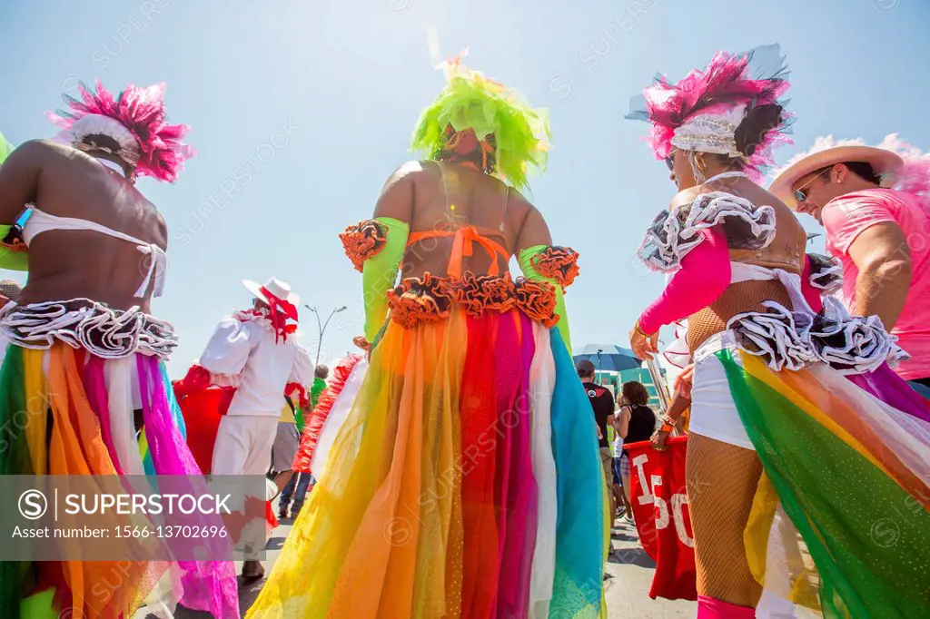 Waving Cuban and rainbow-colored flags, hundreds of Cubans march through the streets of Havana, Cuba's capital, against homophobia and transphobia led...