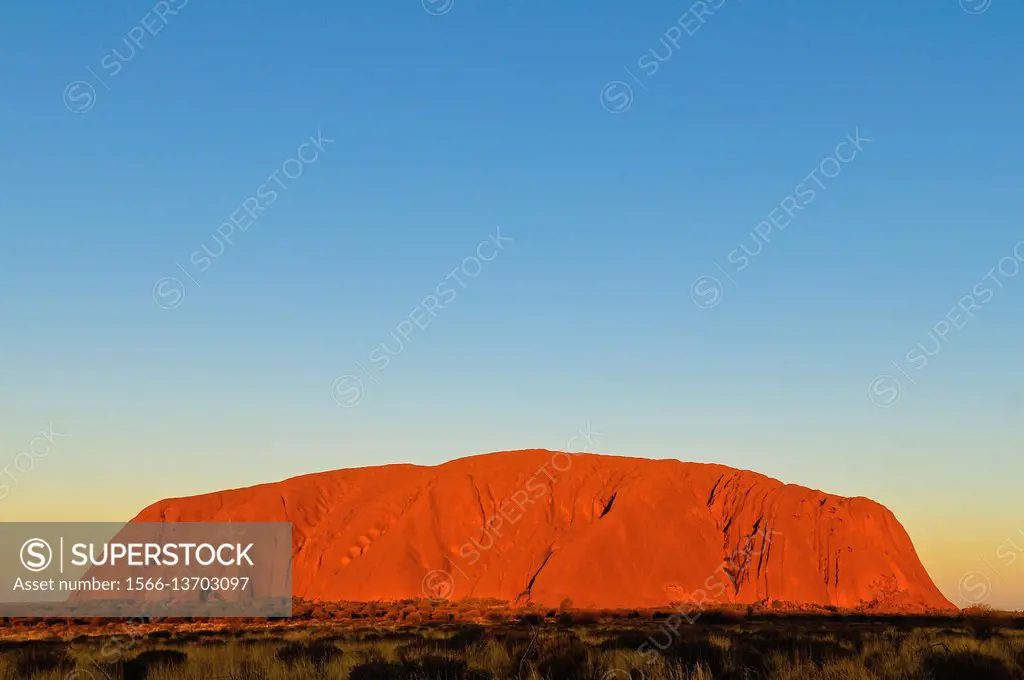 Rock formations on landscape, Uluru, Uluru-Kata Tjuta National Park, Northern Territory, Australia, Oceania