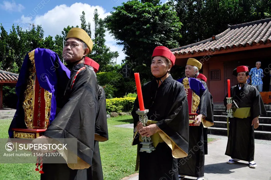 Naha, Okinawa, Japan, Confucian priests carrying Chinese spirits table’ at Shiseibyo Temple in Naminoue during the inauguration of a new temple