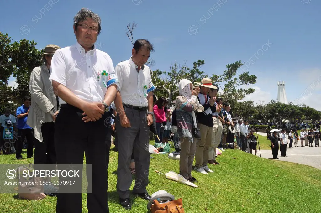Okinawa, Japan, people observing a minute of silence at the Peace Memorial Park, near Itoman, in occasion of the commemoration - 23rd June - of the co...