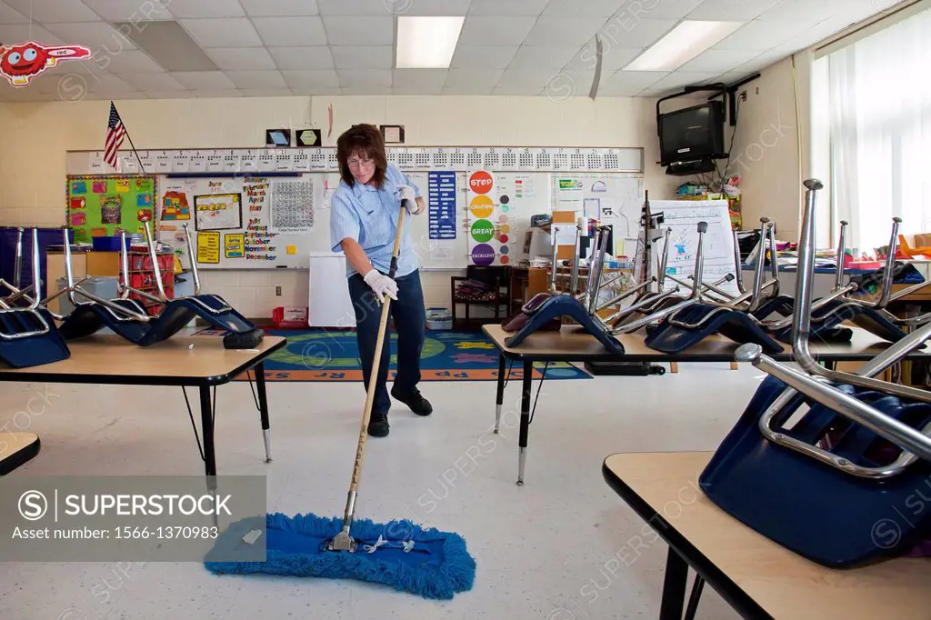 West Branch, Michigan - School custodian cleans a classroom at Surline Elementary and Middle Schools. School support staff are members of the United S...