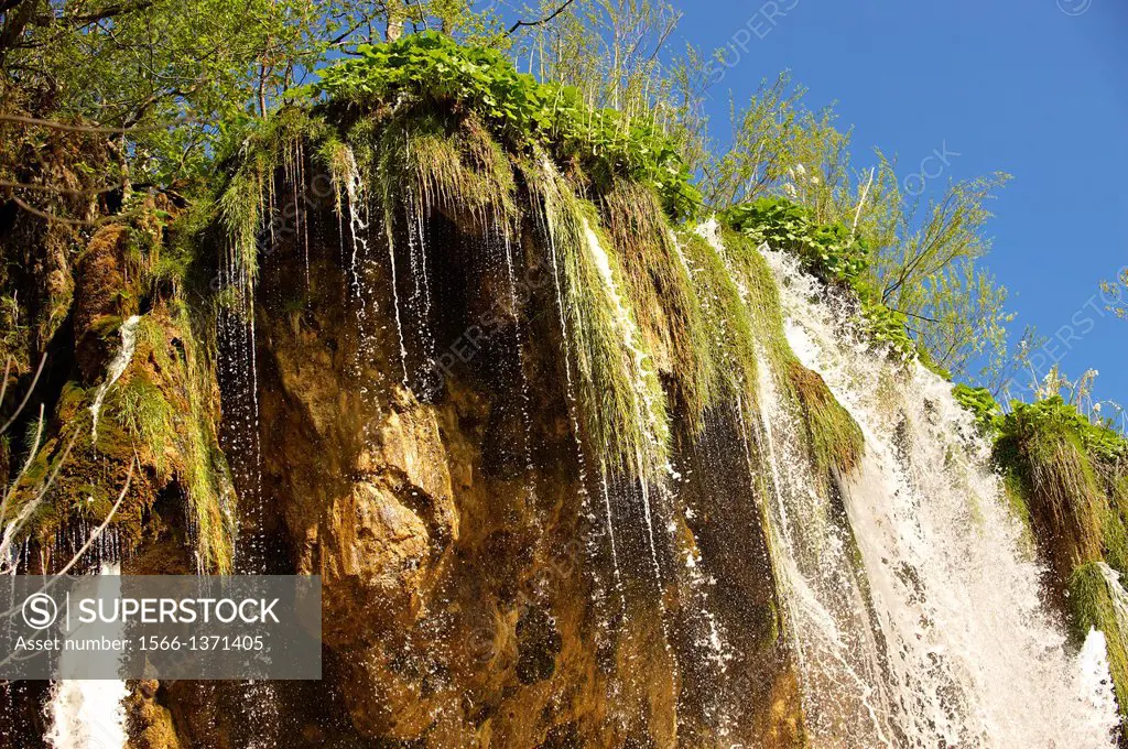 Waterfall over the travatine rocks of the Plitvince lakes, Croatia, A UNESCO World Heritage Site.