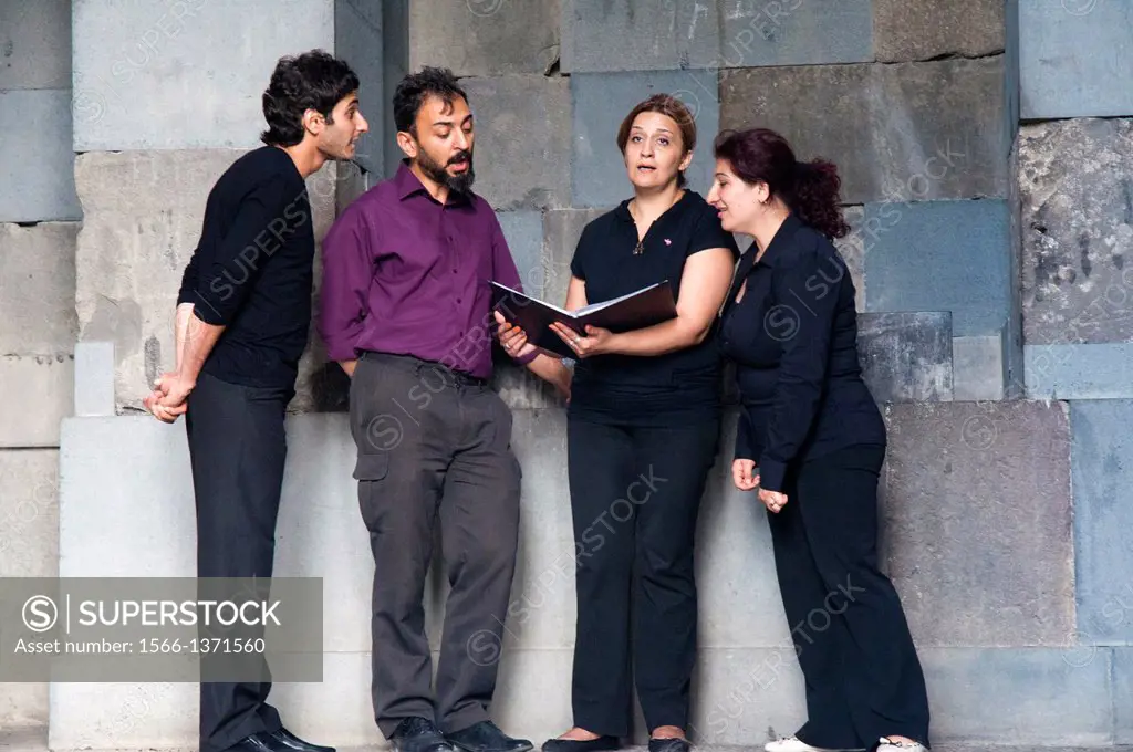 A quartet of vocalists performing at the restored classical temple of Garni, Armenia.