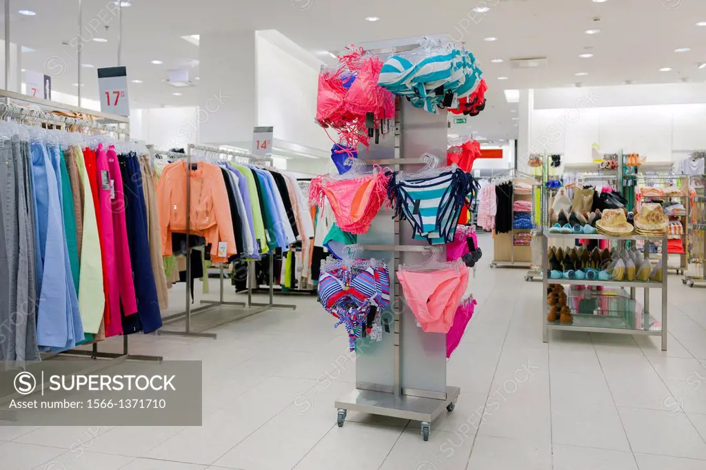 Woman`s underwear. Lingerie on rack. Retail shop, store. - SuperStock