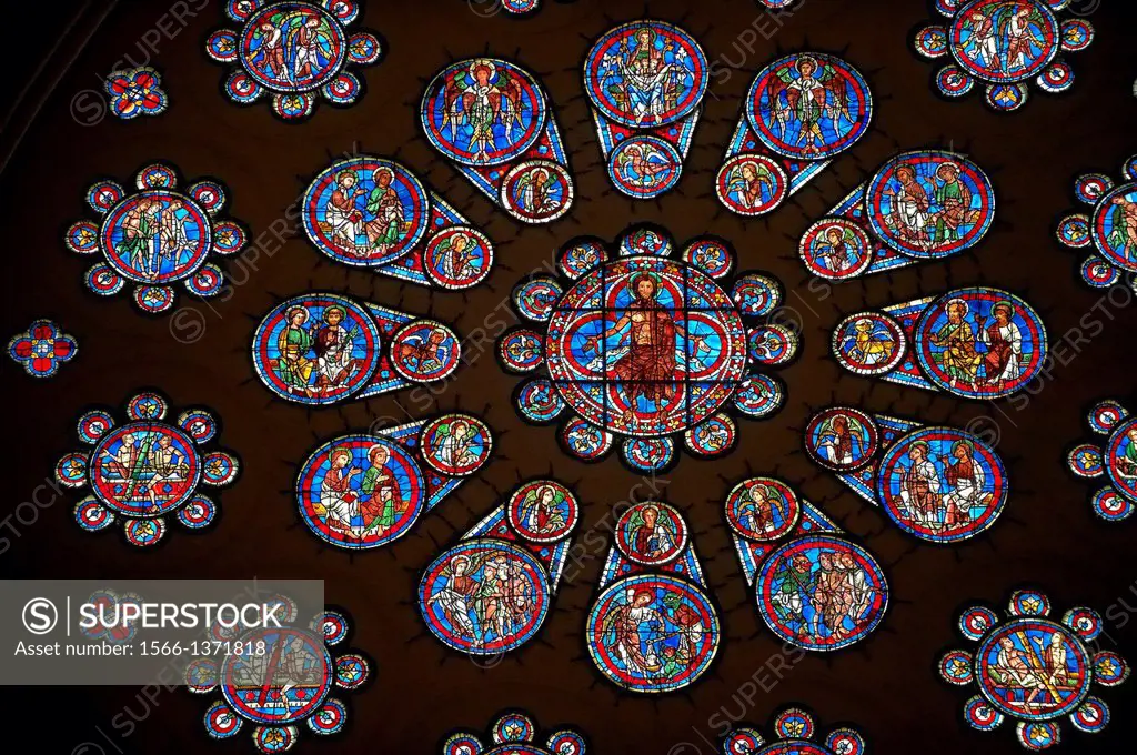Medieval western rose window of the Gothic Cathedral of Chartres, France. A UNESCO World Heritage Site. The western rose, made c.1215 shows the Last J...