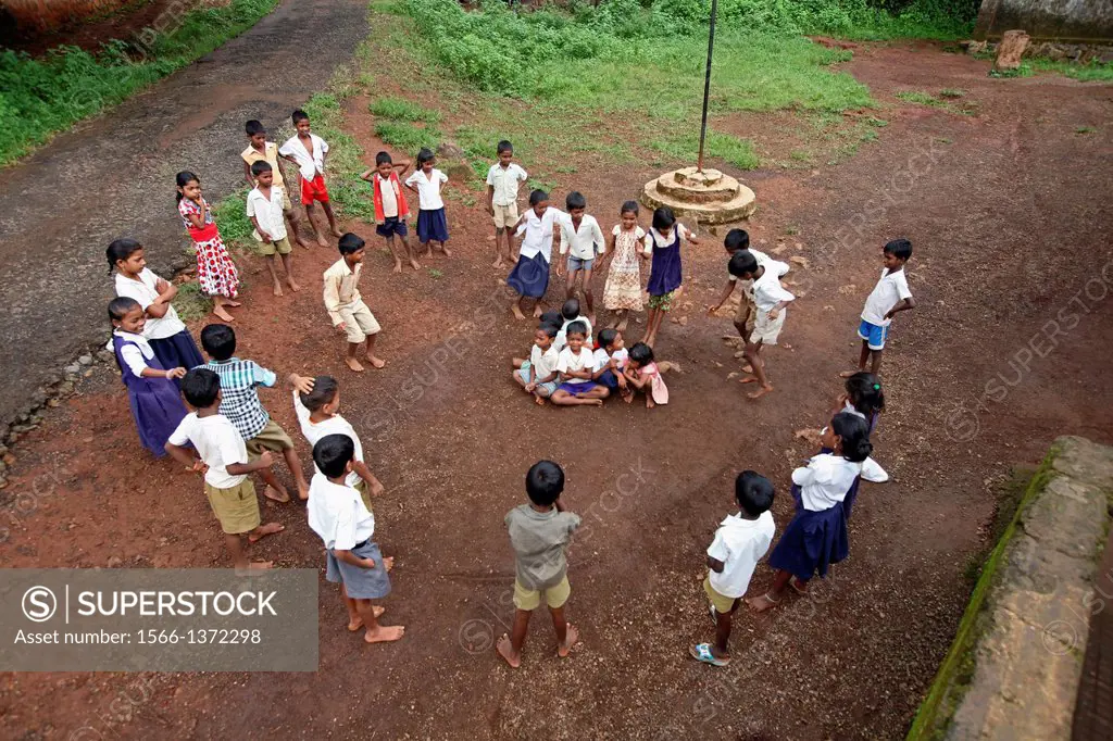A group of Katkari tribal children playing, Maharashtra, India. The Katkari are an Indian Hindu community mostly belonging to the state of Maharashtra...