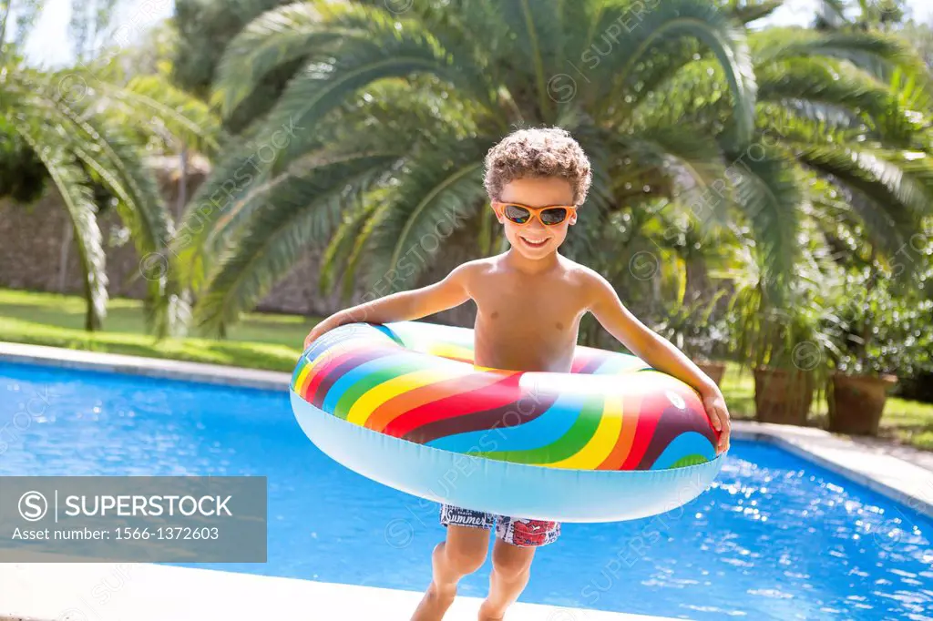 Young boy enjoys summer.