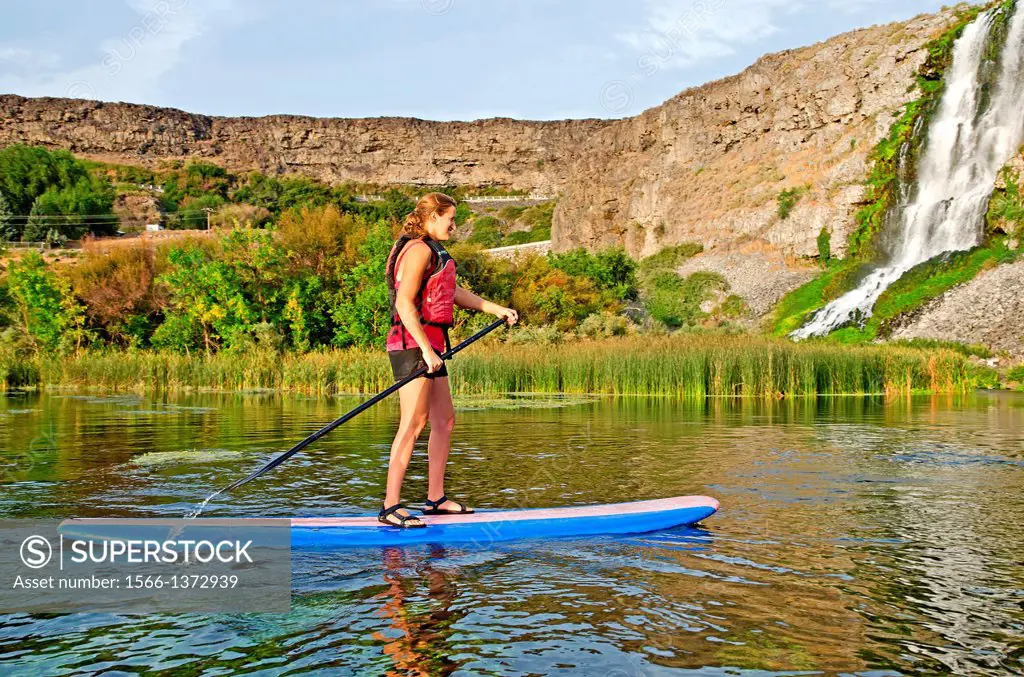 Riding the Standup Paddle Board at Thousand Springs in the Snake River Canyon near the city of Hagerman in southern Idaho.