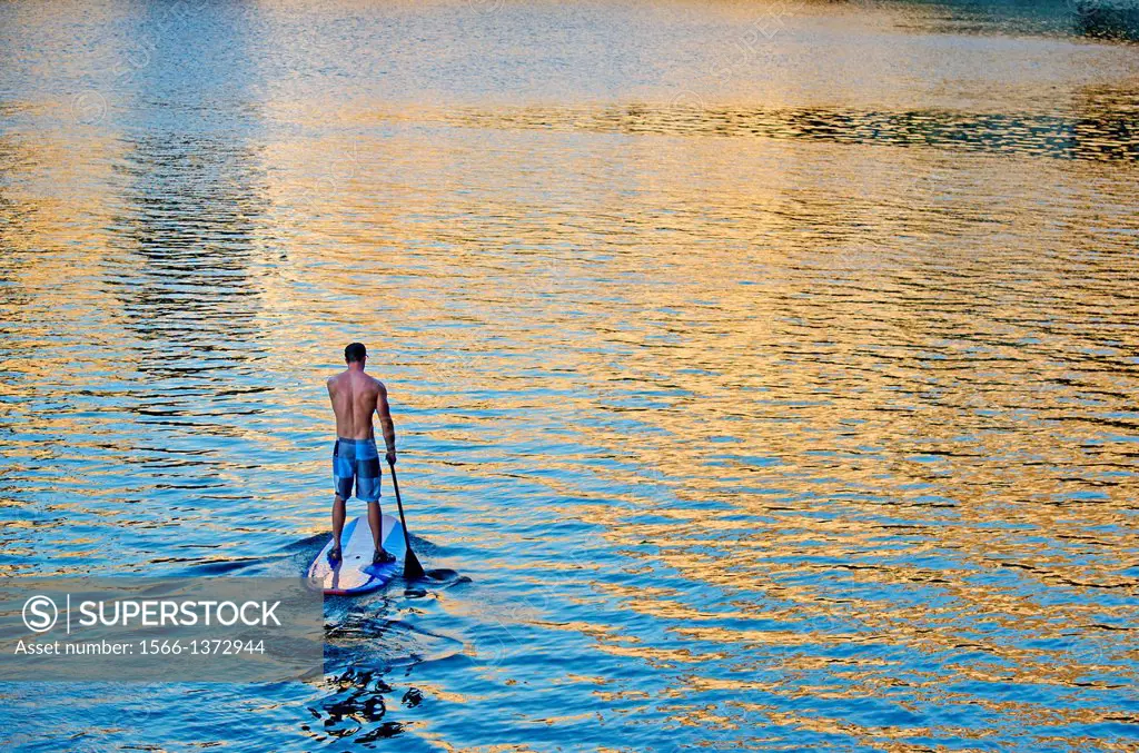 Riding the Stand Up Paddle Board at Shoshone Falls on the Snake River in the Snake River Canyon near the city of Twin Falls in southern Idaho.