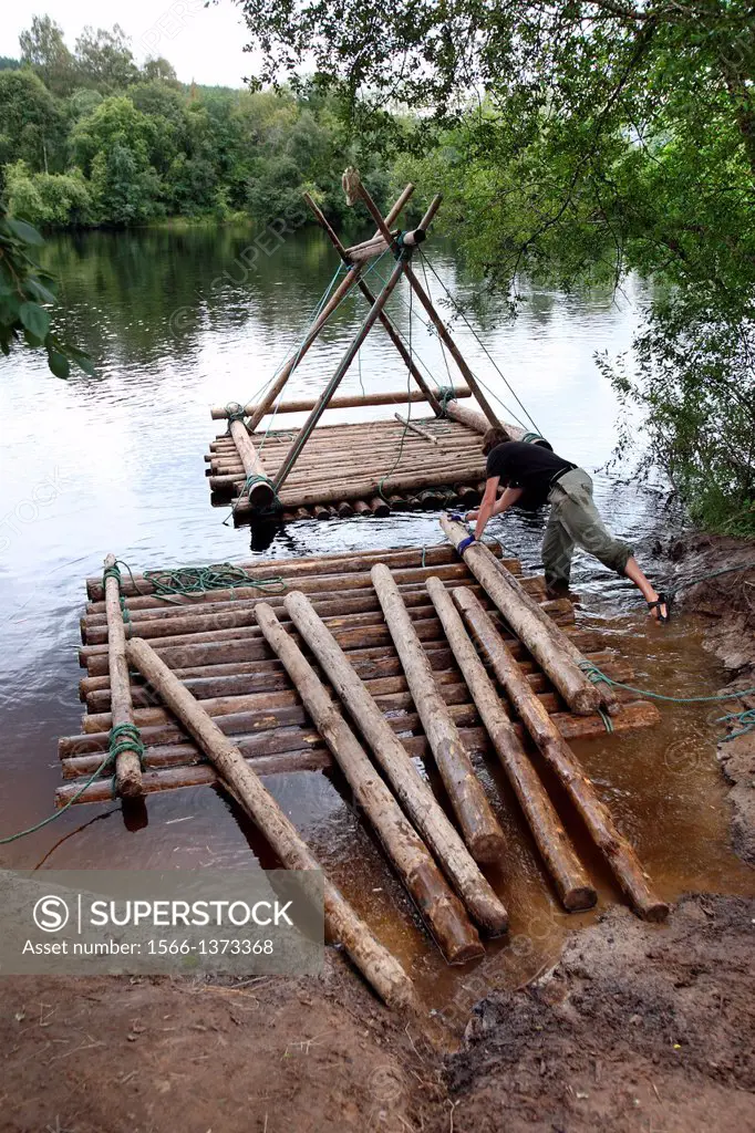 Building timber rafts on Klar Alven. Varmland, Sweden.