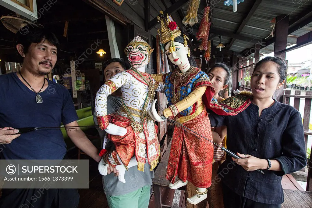 Performers holding traditional Thai puppets, Bangkok Thailand.