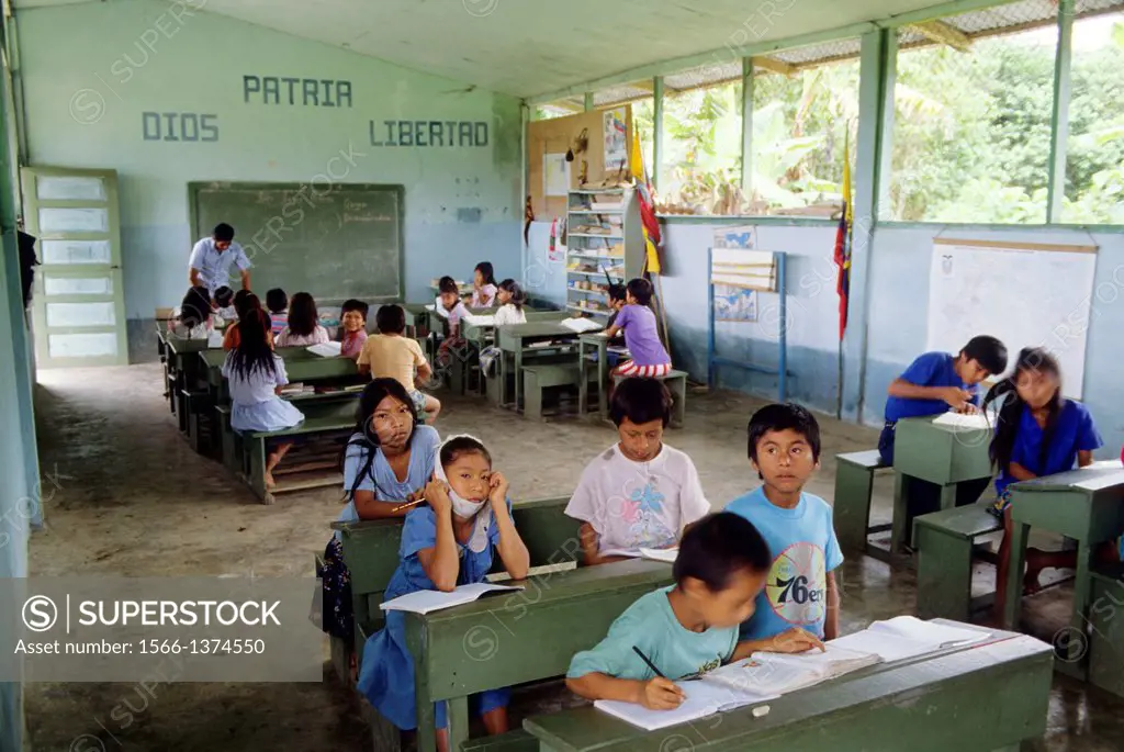 ECUADOR, AMAZON BASIN, NEAR COCA, RIO NAPO, LOCAL SCHOOL, TEACHER & SCHOOL CHILDREN.