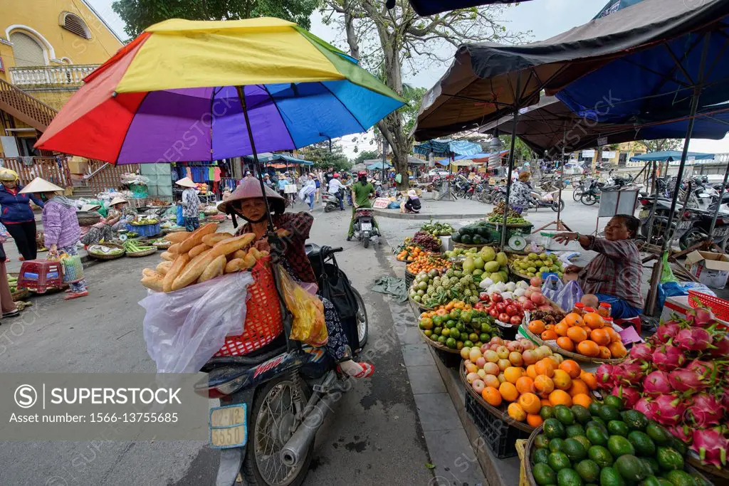 French bread vendor, Hoi An, Vietnam.