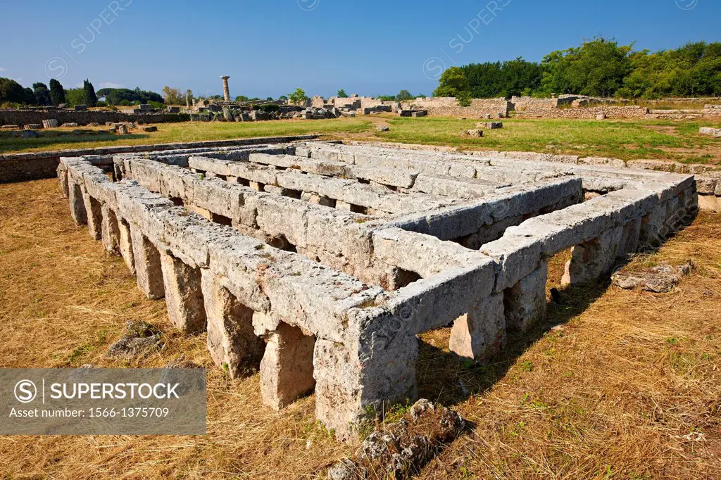 Base of a Roman Temple ( 200 BC) in Paestum dedicated to the Capitoline Triad, Jupiter, Juno and Minerva, in the Roman Forum. Paestum archaeological s...
