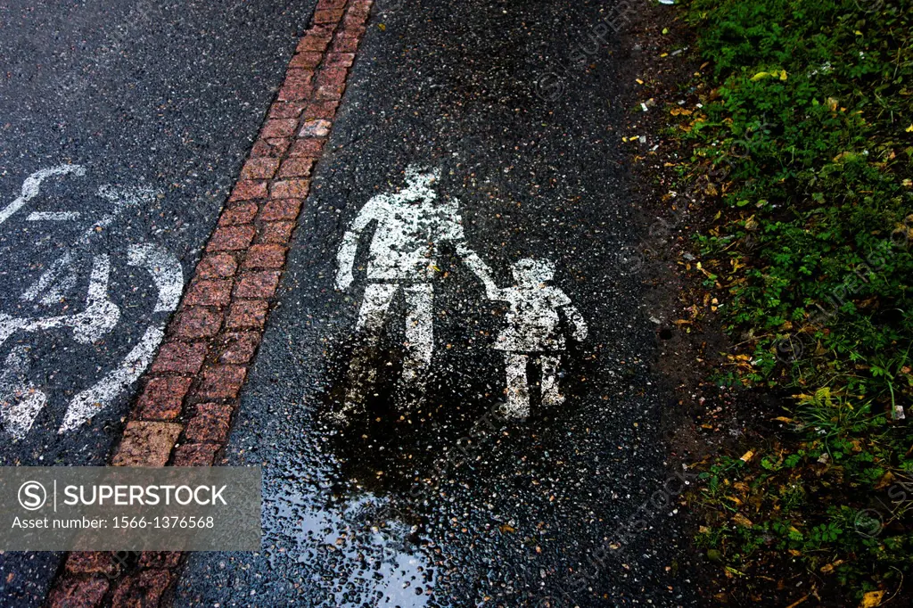 Pedestrian sign and bike lane, Helsinki, Finland.