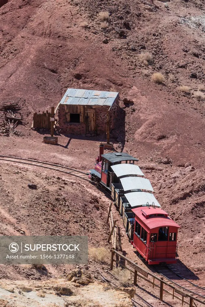 Historic train driving through the valley in Calico Ghost Town, California, USA
