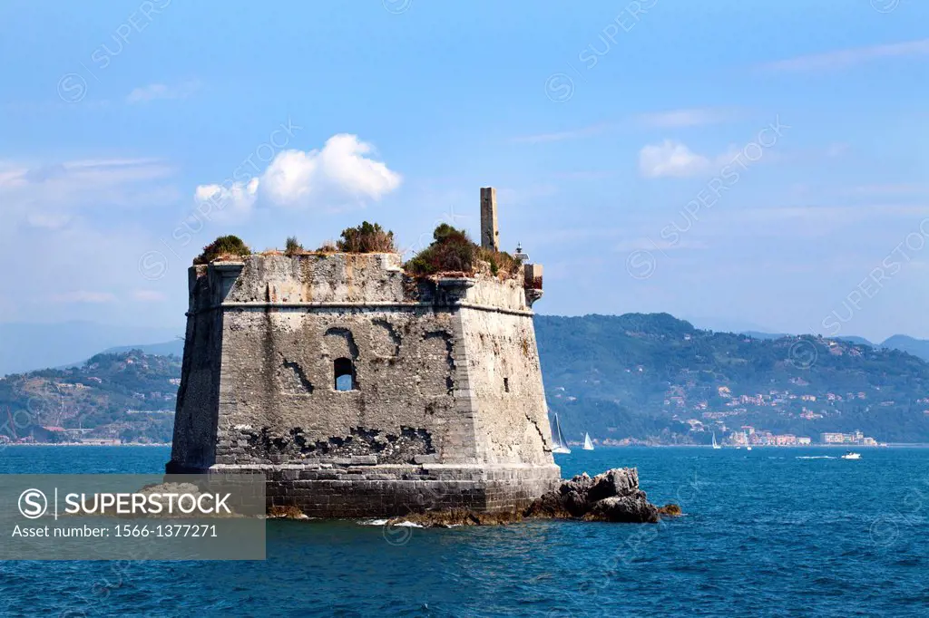 Ruined Stone Fortress Torre della Scuola serves as a Working Lighthouse near Palmaria Island Porto Venere Liguria Italy.