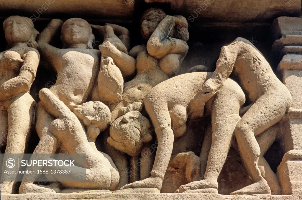 Erotic sculptures, Khajuraho Group of Monuments, UNESCO World Heritage Site, Madhya Pradesh, India, Asia.