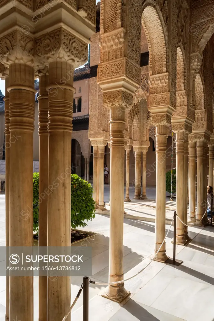 Stilted arches in the gallery of Court of the Lions in Alhambra palace. Granada, Spain.