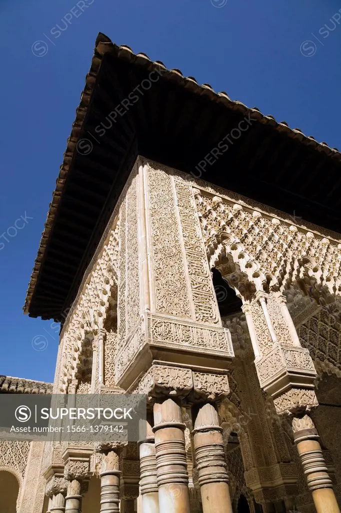 Moorish architectural building details at The Court of the Lions on the Alhambra palace grounds, Granada, Spain, Europe.