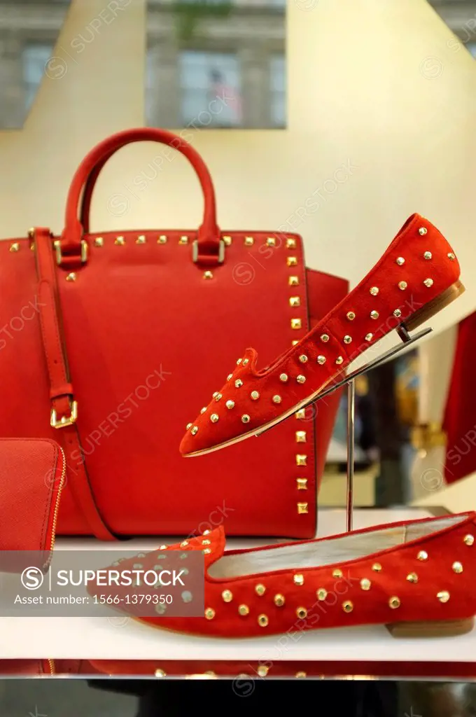 Red Lady´s Handbag, Flats Shoes and Wallet Displayed in a Retail Store Showcase Window, New York City