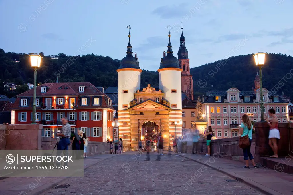 Old Bridge gate and the old town in Heidelberg at night, Baden-Württemberg, Germany.