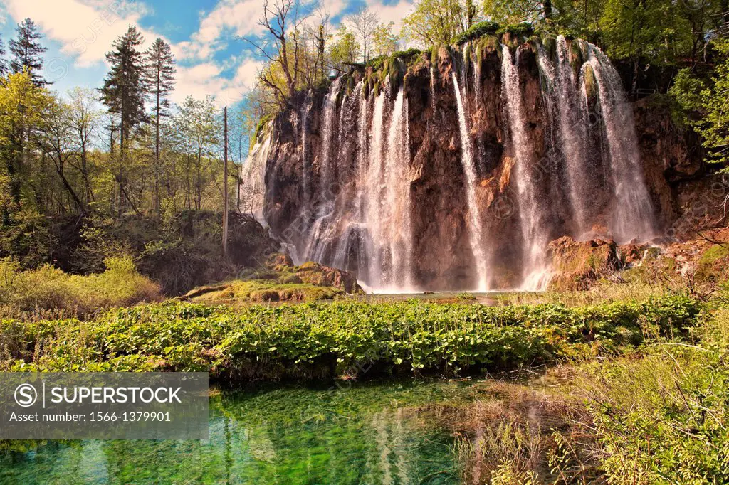 Waterfall over the travatine terraces of Plitvince National Park, Croatia.