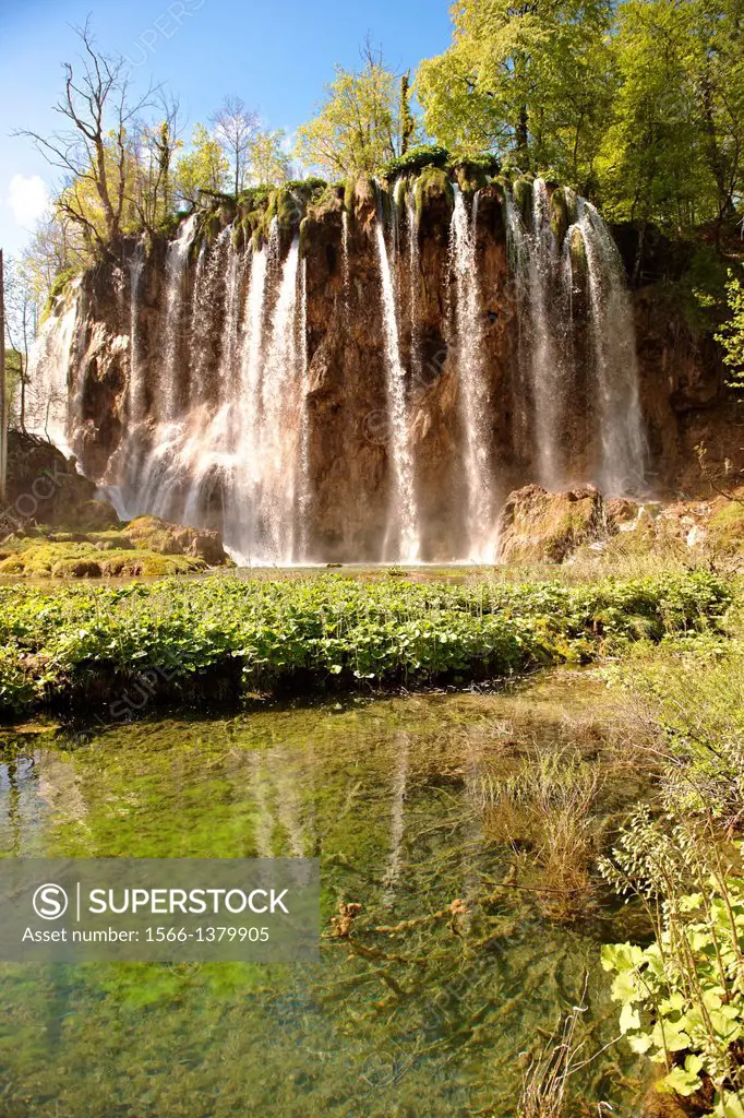 Waterfall over the travatine terraces of Plitvince National Park, Croatia.