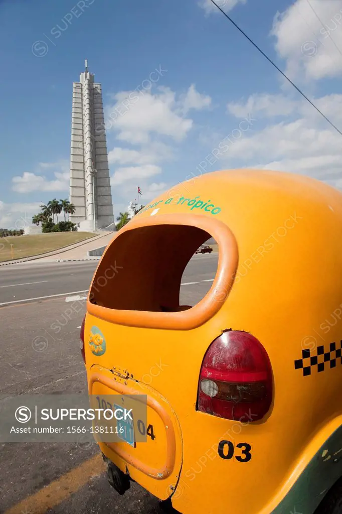 Coco taxi in front of the Jose Marti Monument, Plaza de la Revolucion, Havana, Cuba, Central America.