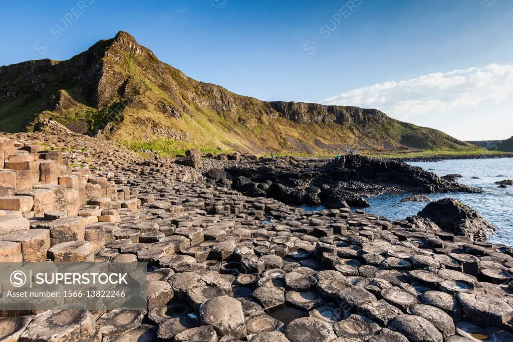 UK, Northern Ireland, County Antrim, Bushmills, Giants Causeway, Unesco World Heritage Site, coastal rock formation of basalt, dusk.