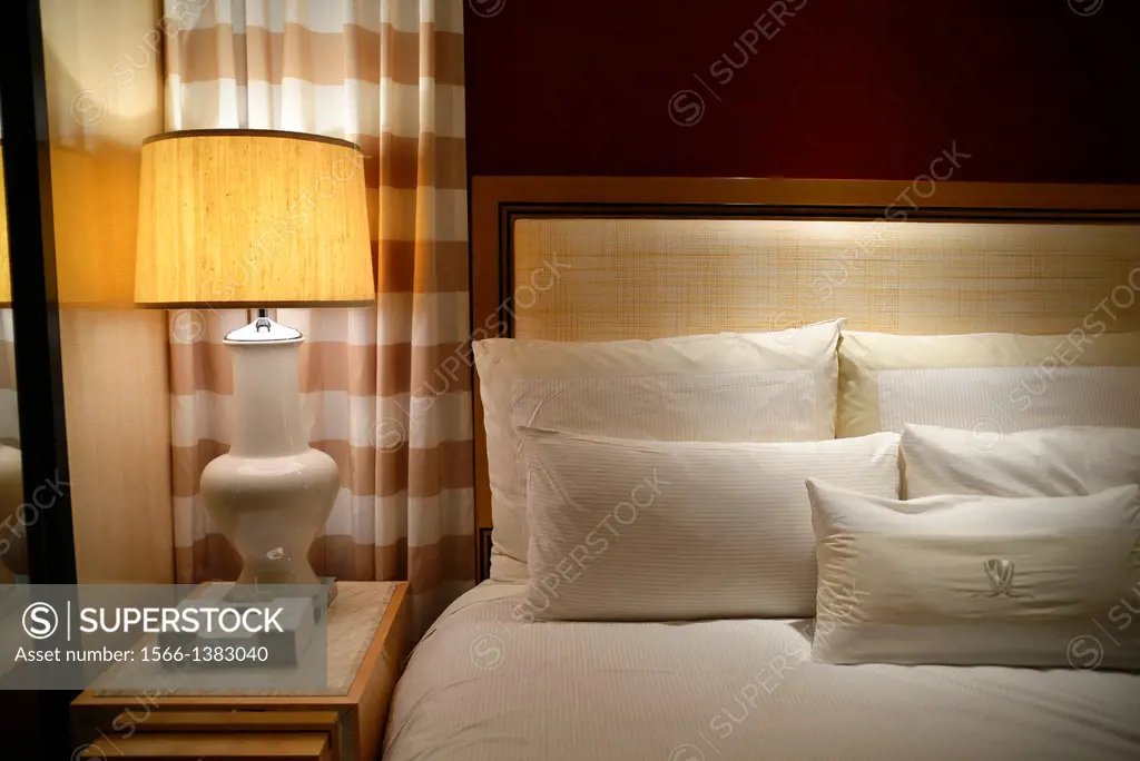 Close Up of King Size Bed and Night Stand in a Luxury Las Vegas, NV Hotel.