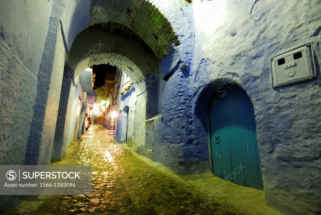 Street with arches in the medina of Chefchaouen, Morocco.