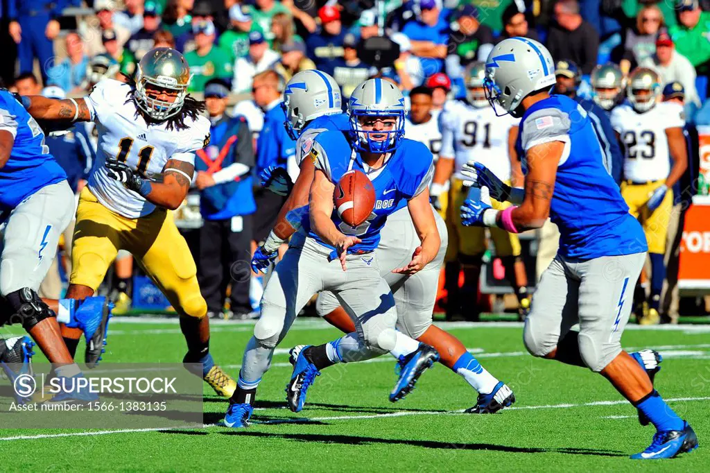 Air Force freshman quarterback Nate Romine pitches to wide receiver Sam Gagliano during the Air Force-Notre Dame game Oct. 26, 2013 at Falcon Stadium....