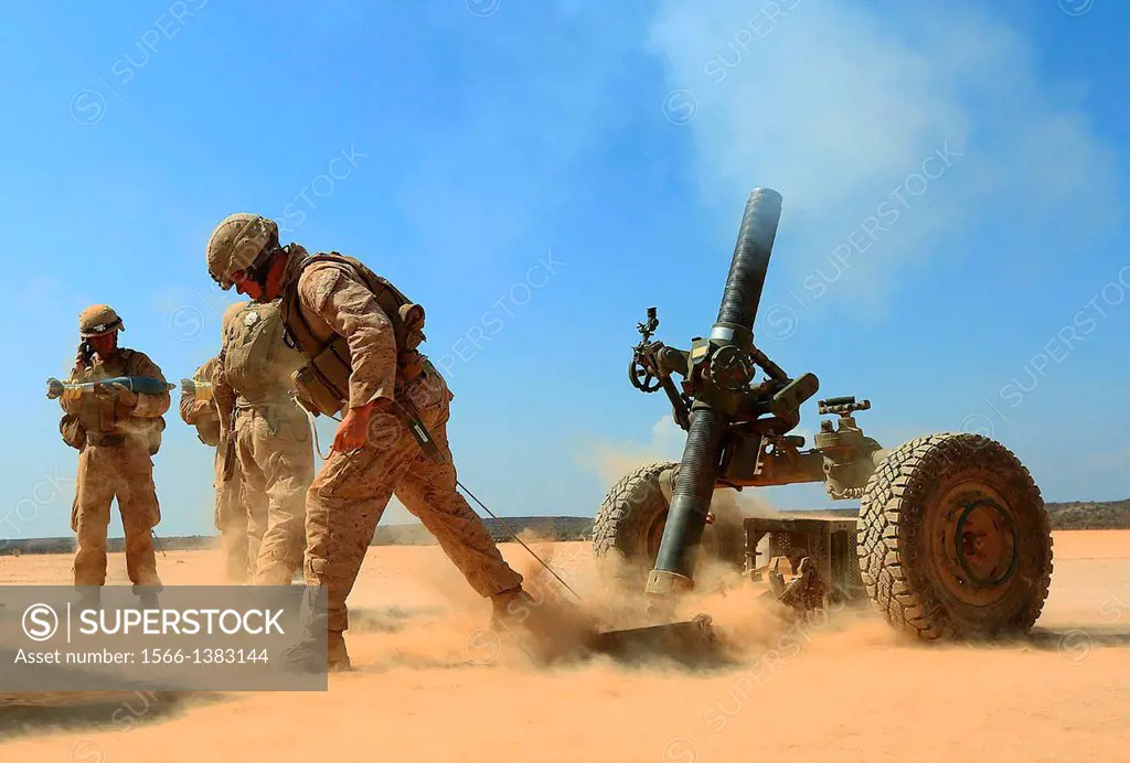DJIBOUTI, AFRICA (Oct.30, 2013) - A Marine with Alpha Battery, 1st Battalion 4th Marines, 13th Marine Expeditionary Unit fires a 120MM Rifled Tower Mo...