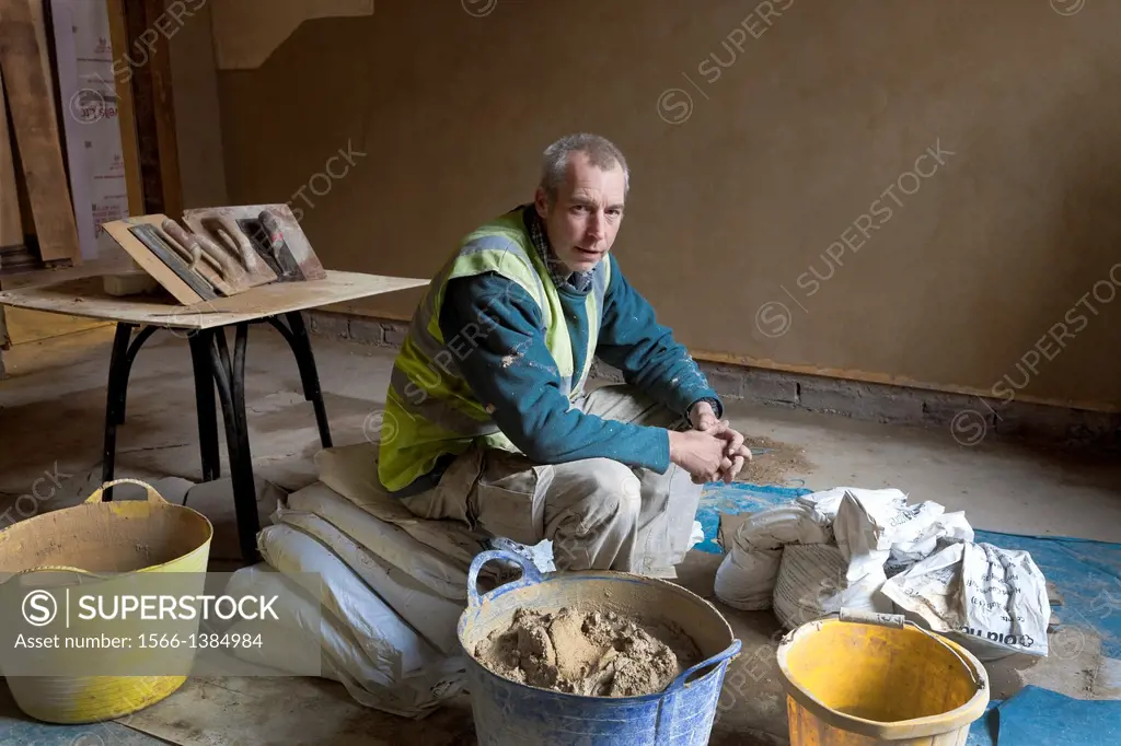 Traditional lathe and lime plasterer, working on the renovation at Fairfield, Govan Road, Glasgow.