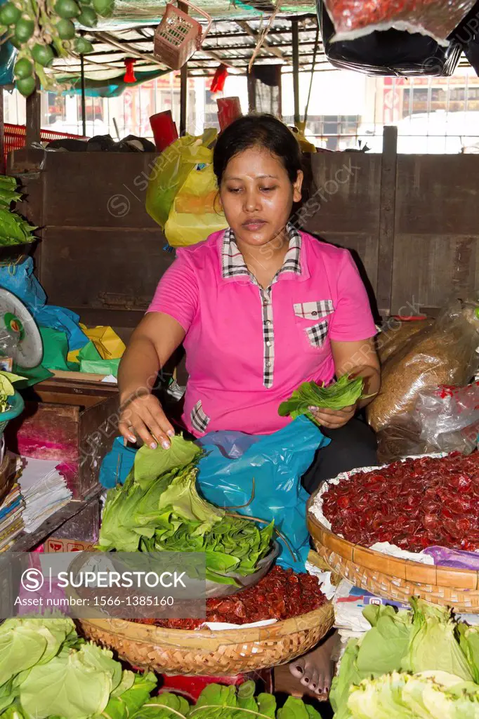 Vegetable Sales on a Market in Phnom Penh, Cambodia.