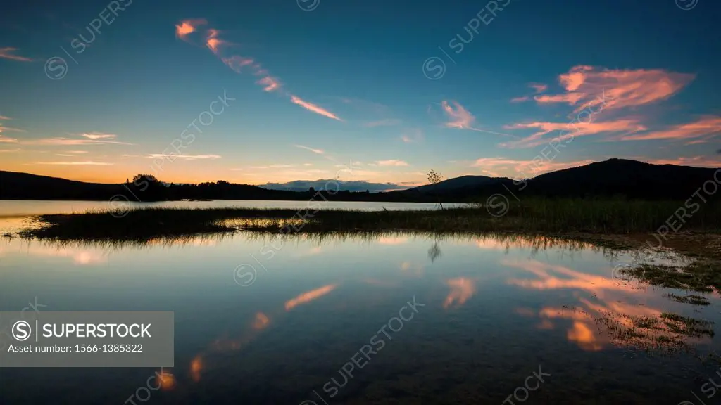 Reflections captured in the reservoir of Uribarri Gamboa from upcoming place to Landa village in Alava Basque Country.