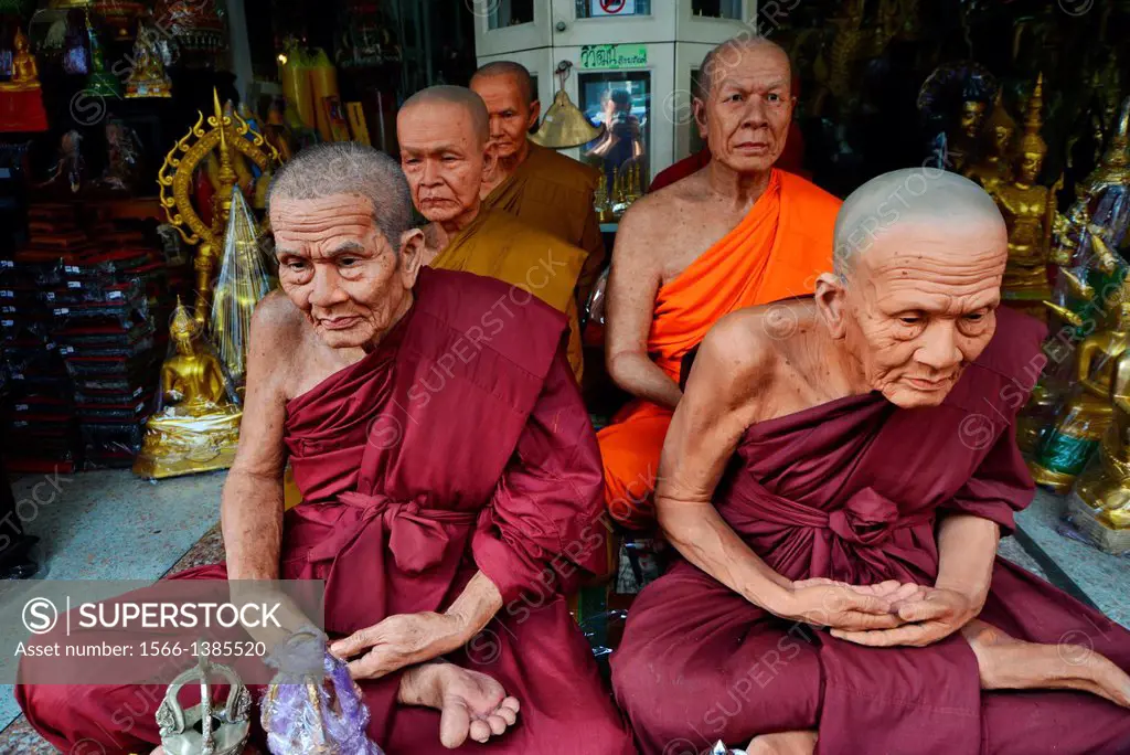 Super realistic Buddhist monk statue at the shop of Buddhist altar fittings.