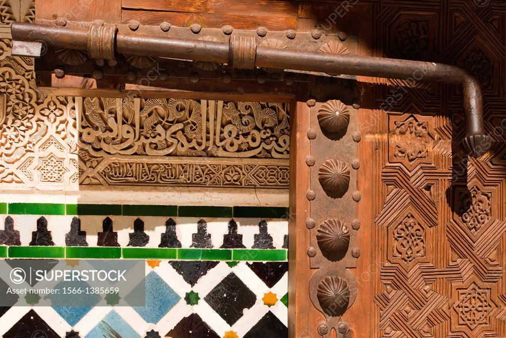 Door detail and decoration in Patio de los Arrayanes, Courtyard of the Myrtles, Nazaries palaces, Nasrid dynasty, Alhambra, Granada, Andalusia, Spain.