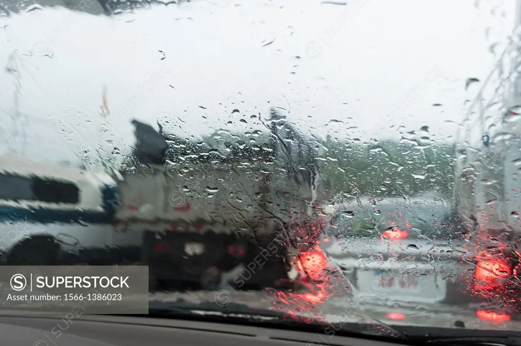 Trucks and cars on a ferry in rain, New Brunswick, Canada