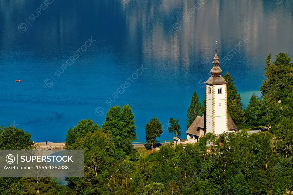 Slovenia, Gorenjska region, Triglav National Park, Bohinj lake and Church of St. John the Baptist.